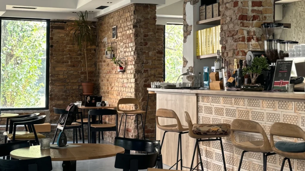 Interior seating and espresso bar at Kawa coffee shop in Sarajevo